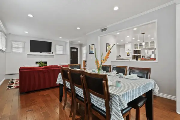 Open living area with seating and access to the kitchen