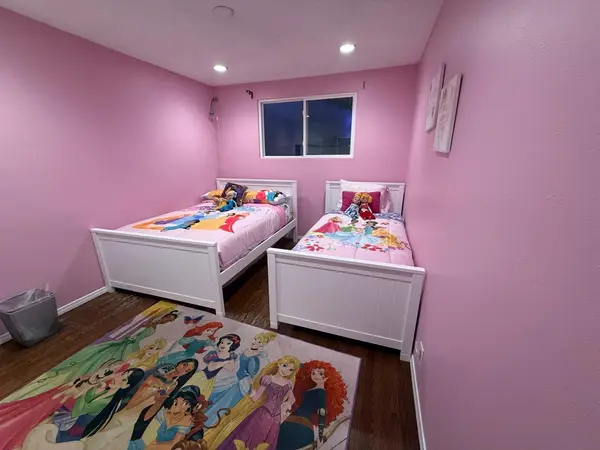 Princess-inspired bedroom with two beds